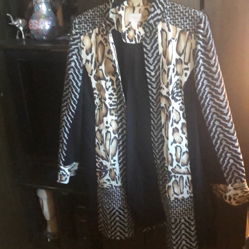 Printed fabric duster with animal print trim it is washable worn once.